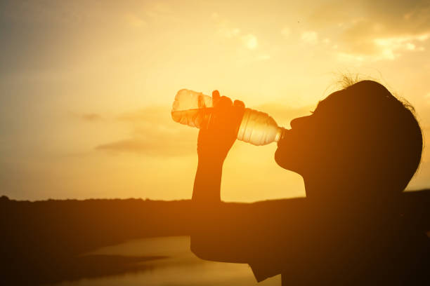istock Silhouette women drink water. 689270596