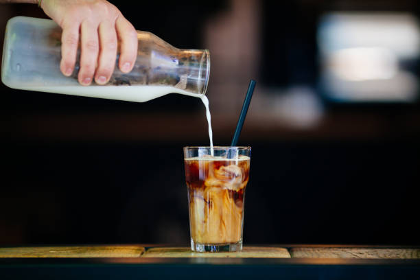 istock Pouring cream in cold brew coffee 689271088