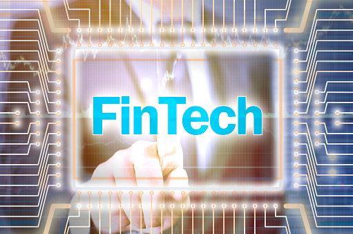 Businessman pointing on financial technology