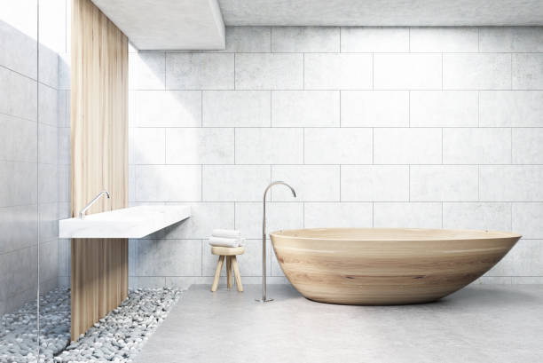istock Gray brick bathroom, wooden tub, front 689274008