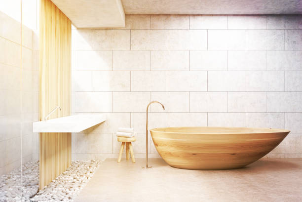 istock Gray brick bathroom, wooden tub, front, toned 689274068