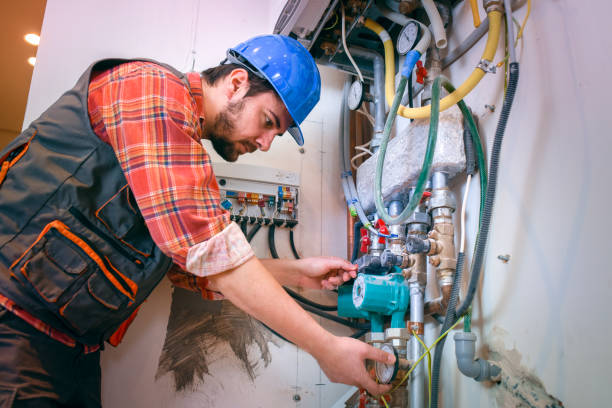 technician installing heating system - heating engineer imagens e fotografias de stock