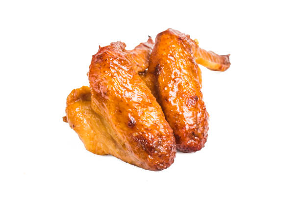 istock Grilled chicken wings on a white background 689303008