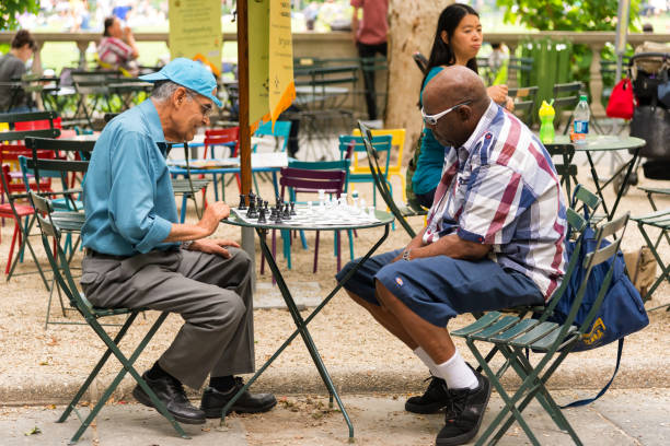 People playing chess in bryant park. New York City stock photo