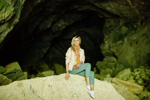 istock woman relax in cave 689317226