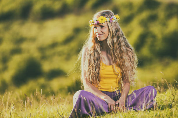 istock Woman enjoys at the meadow 689318114