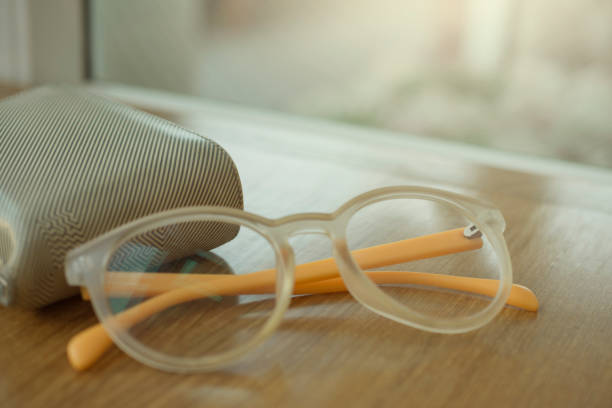 istock Glasses and wallets put on wooden boards. All is needed before leaving home. 689326436