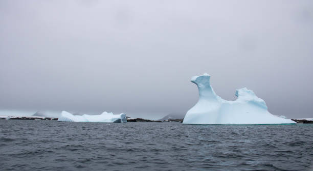 istock Antarctica: Iceberg in the Penola Strait 689327568