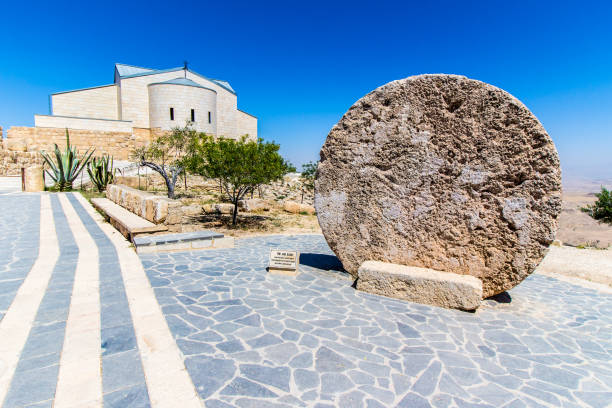 The Memorial church of Moses at Mount Nebo The Memorial church of Moses and the old portal of the monastery at Mount Nebo, Jordan mount nebo jordan stock pictures, royalty-free photos & images