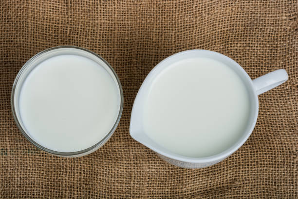 istock Cow milk and ceramic jug 689327840