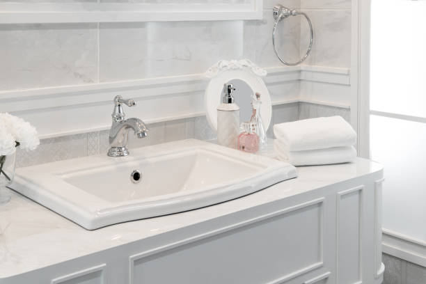 istock Bathroom interior with sink and faucet. 689330620