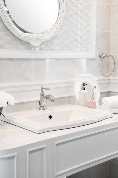 istock Bathroom interior with sink and faucet. 689330634