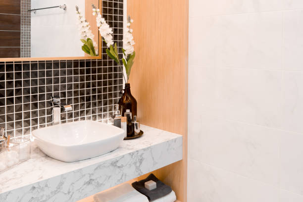 istock Bathroom interior with sink and faucet. 689330682