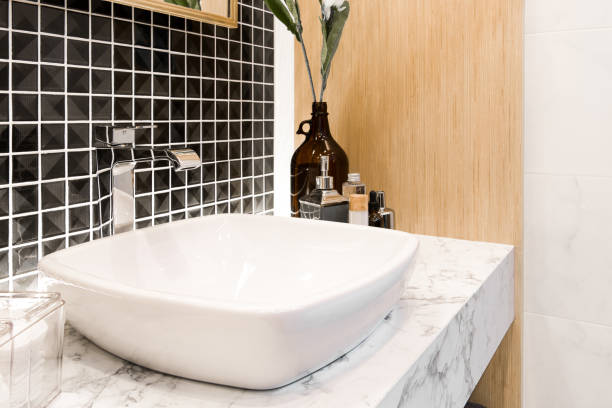 istock Bathroom interior with sink and faucet. 689330684