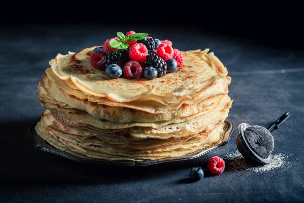 istock Tasty stack of pancakes with blueberries and raspberries 689341264