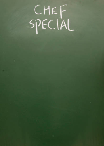 istock chef special  title handwritten with chalk on blackboard 689347648