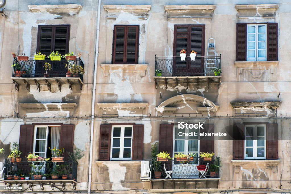 Facade of an old building in Palermo Facade of an old residential building in Palermo, Sicily Architecture Stock Photo