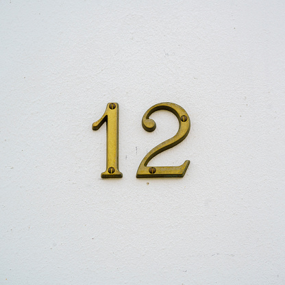 Brass house number twelve