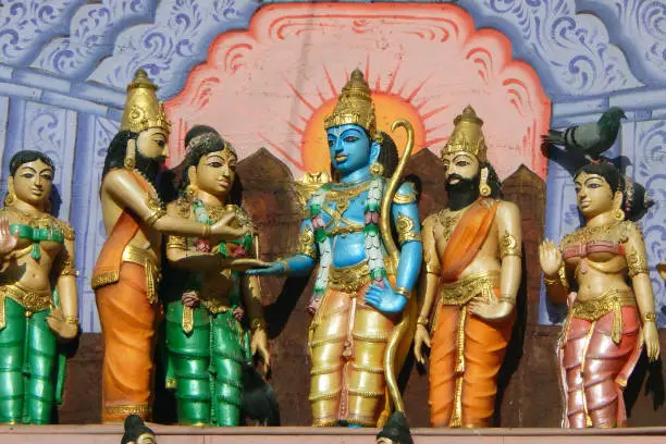 Wall art of Hindu God Sri Rama and Goddess Sita getting married scene or Sita Rama Kalyanam on the exterior of a temple , Hyderabad,India