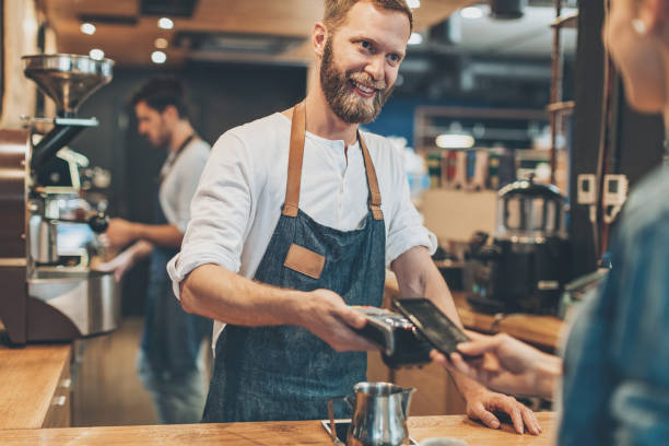 istock Smart phone payment in the coffee shop 689366720