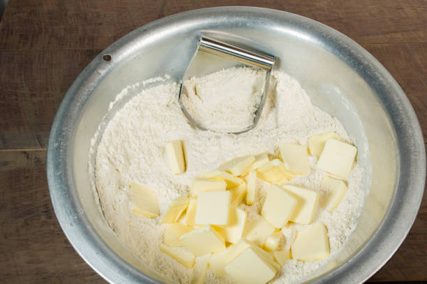 istock Combining butter and flour for baking 689374258