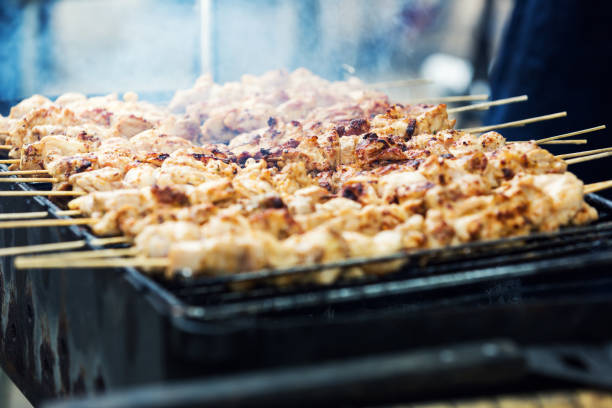 istock grilled chicken meat on skewers 689383104