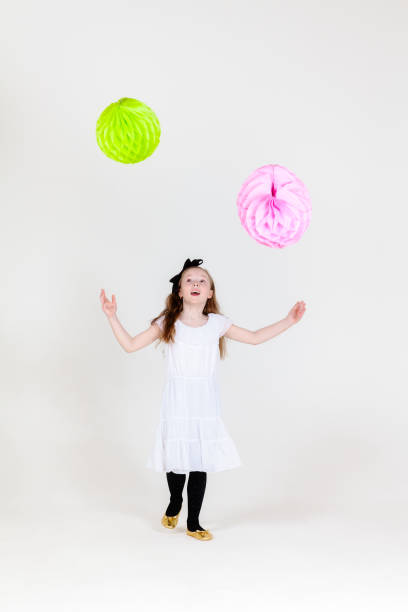 istock Girl with balls 689383258