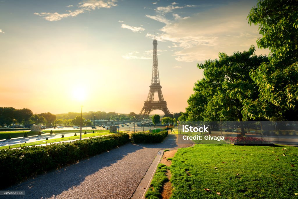Tower near park in Paris Eiffel tower near green park in Paris, France Eiffel Tower - Paris Stock Photo