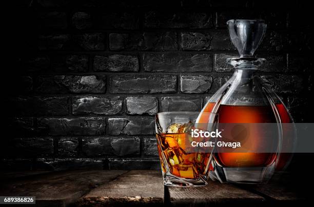 Whiskey And Brick Wall Stock Photo - Download Image Now - Alcohol - Drink, Arts Culture and Entertainment, Bar - Drink Establishment