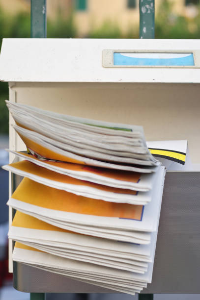 istock Mailbox full of advertising leaflets 689386946