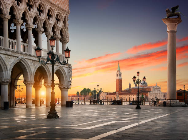 Square San Marco Square San Marco with the view on Palazzo Ducale and San Giorgio Maggiore in Venice at sunrise, Italy campanile venice stock pictures, royalty-free photos & images