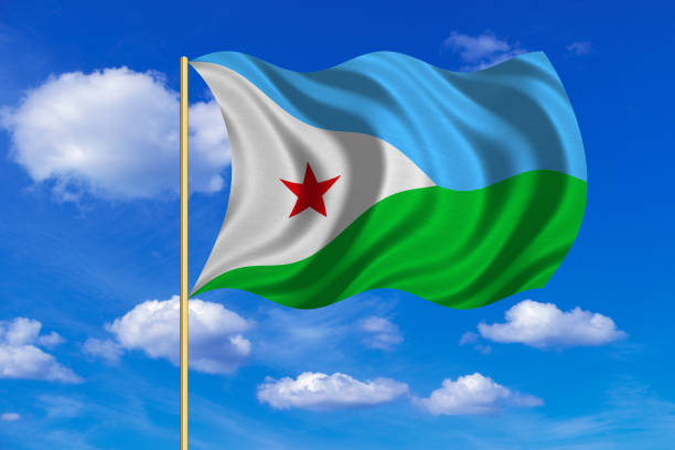 istock Flag of Djibouti waving on blue sky background 689395204