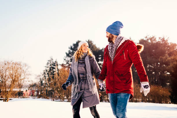 istock Mid Adult Couple Having Fun Outdoors At Winter 689398528