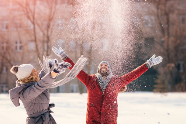 istock Mid Adult Couple Having Fun Outdoors At Winter 689398570