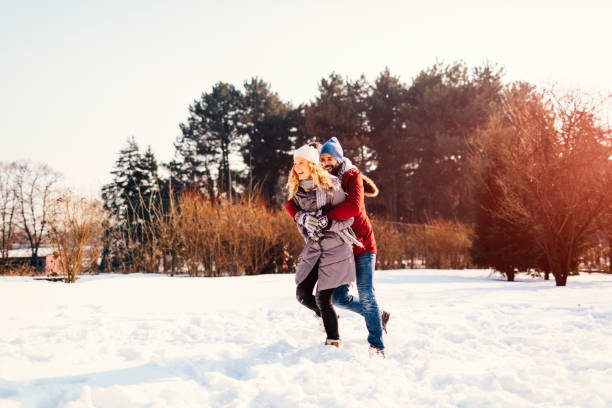 istock Mid Adult Couple Having Fun Outdoors At Winter 689399148