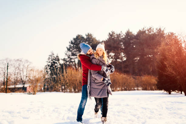 istock Mid Adult Couple Having Fun Outdoors At Winter 689399150