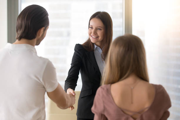 istock Business people shaking hands, greeting handshake with clients at office 689401618