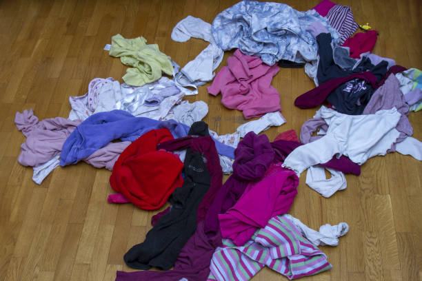 istock Pile of carelessly scattered clothes. 689411434