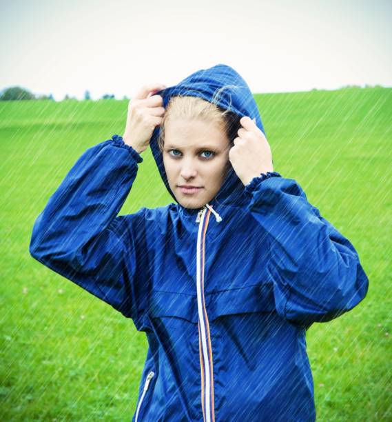 istock Young woman on a rainy day 689419722