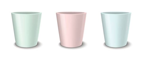 istock Realistic vector empty flower pot set, pastel colors - pink, green and blue. Closeup isolated on white background. Design template for branding, mockup. EPS10 689422792