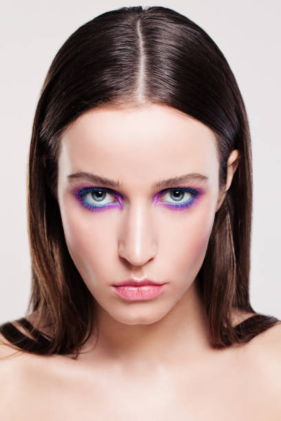 istock Young Woman Face. Makeup and Brown Hair 689425110