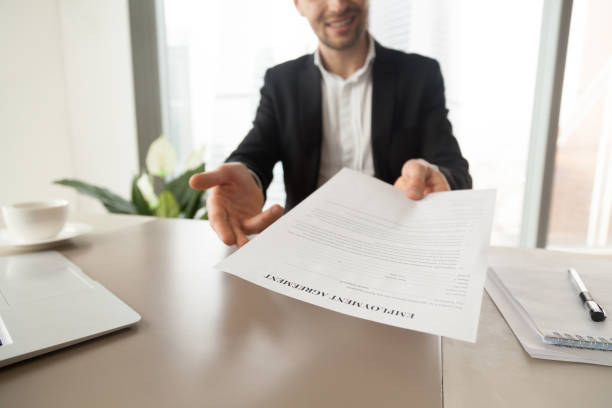istock Recruitment manager offers employment agreement 689425468