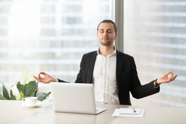 istock Entrepreneur relieves stress with yoga exercises 689425580
