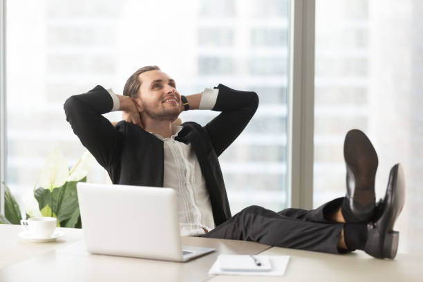 istock Happy businessman thinking about good perspectives 689425596