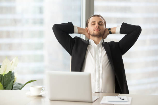 istock Businessman enjoys break after good work done 689425618