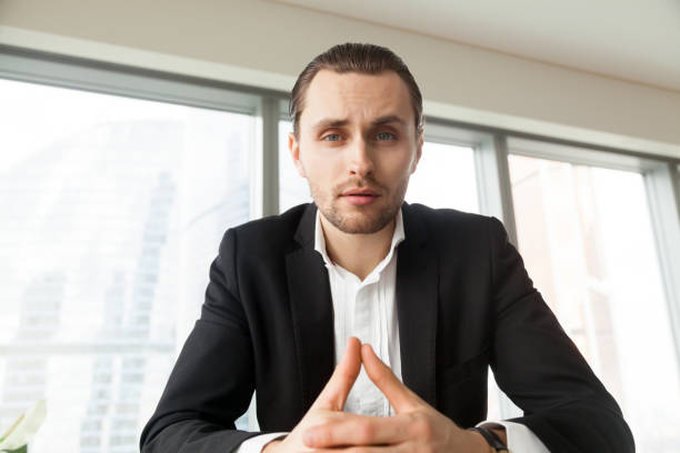 istock Businessman critically evaluates offers on meeting 689425640
