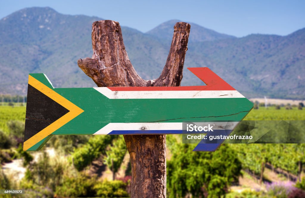 South Africa Flag wooden sign South Africa Flag wooden sign with vineyard background South Africa Stock Photo