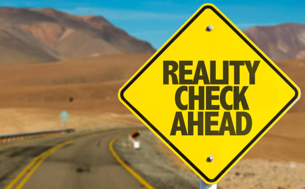Reality Check Ahead Reality Check Ahead sign on desert road information storage and retrieval stock pictures, royalty-free photos & images