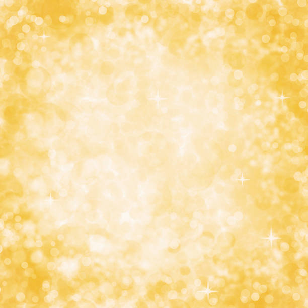 istock Abstract Yellow Background with Sparkle and Bokeh Glitter 689441918
