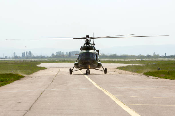 istock Military helicopter at the airport 689444104